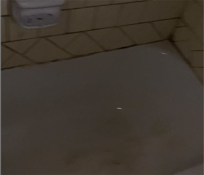 bathtub after fire damage and after cleanup 